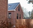 Gevelisolatie en Minerale gevelstrips op woningen met CLT-constructie in Wolfheze op de achterkant van de gevel.